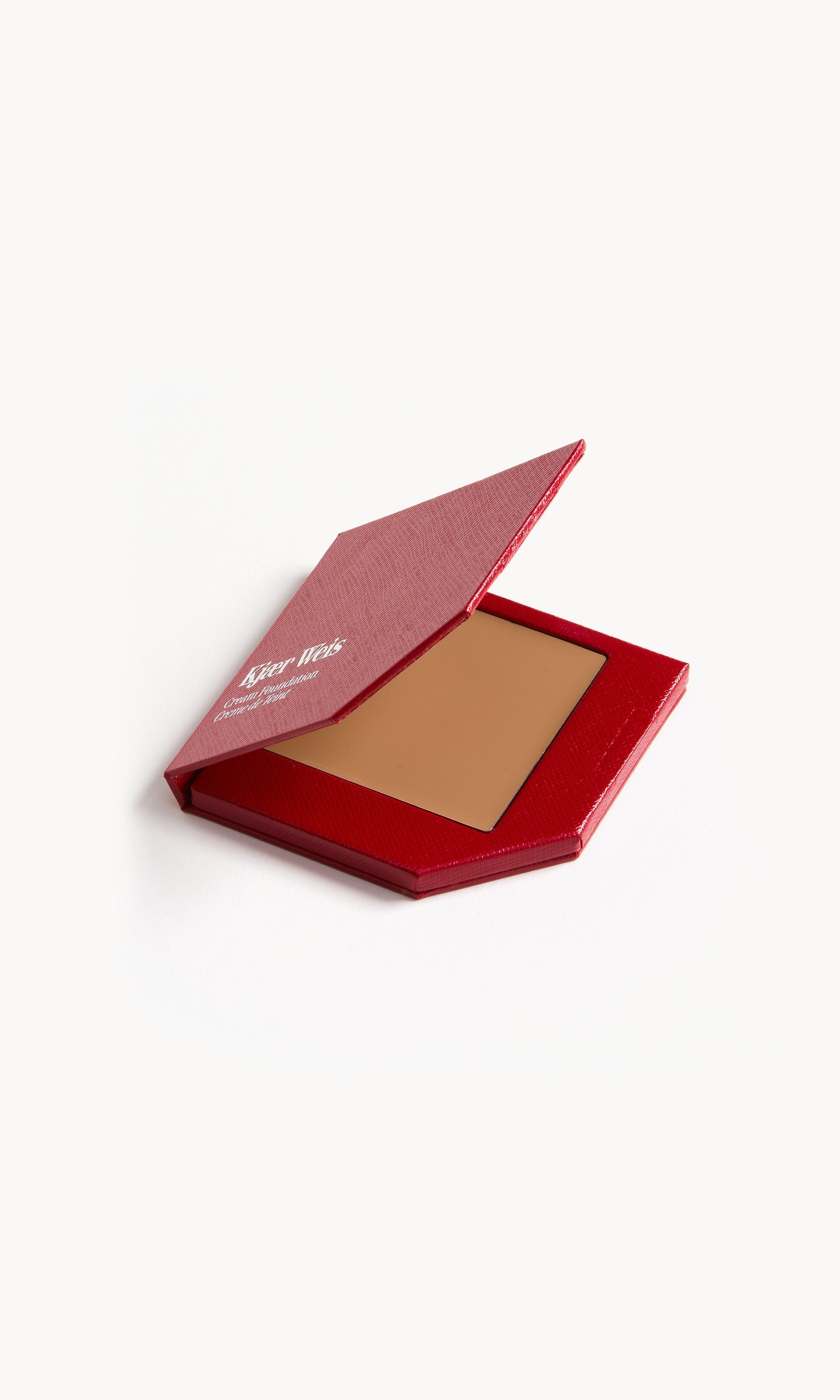 Red KW palette with lid open to show cream foundation