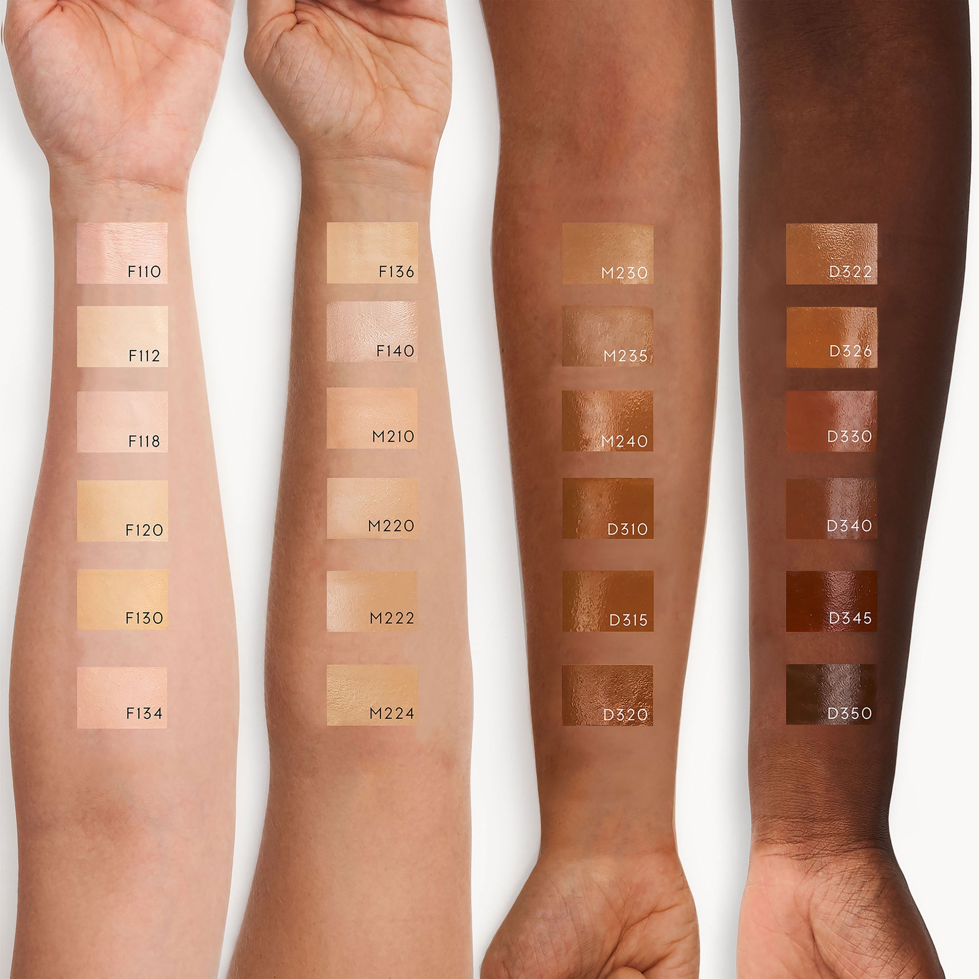 Four arms of different skin tones all with a swatch of cream foundation from darkest to lightest shade. D320 is the darkest shade on the second-deepest skin tone.