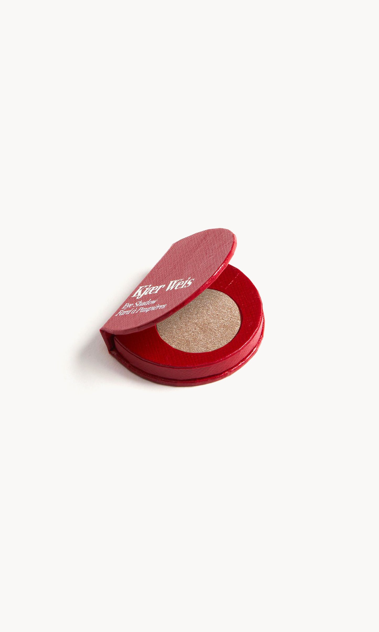 Red KW palette open to show the light mocha eye shadow inside