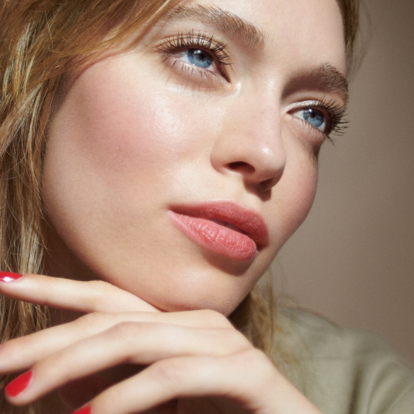 Close up of a person’s face wearing black Im-Possible mascara