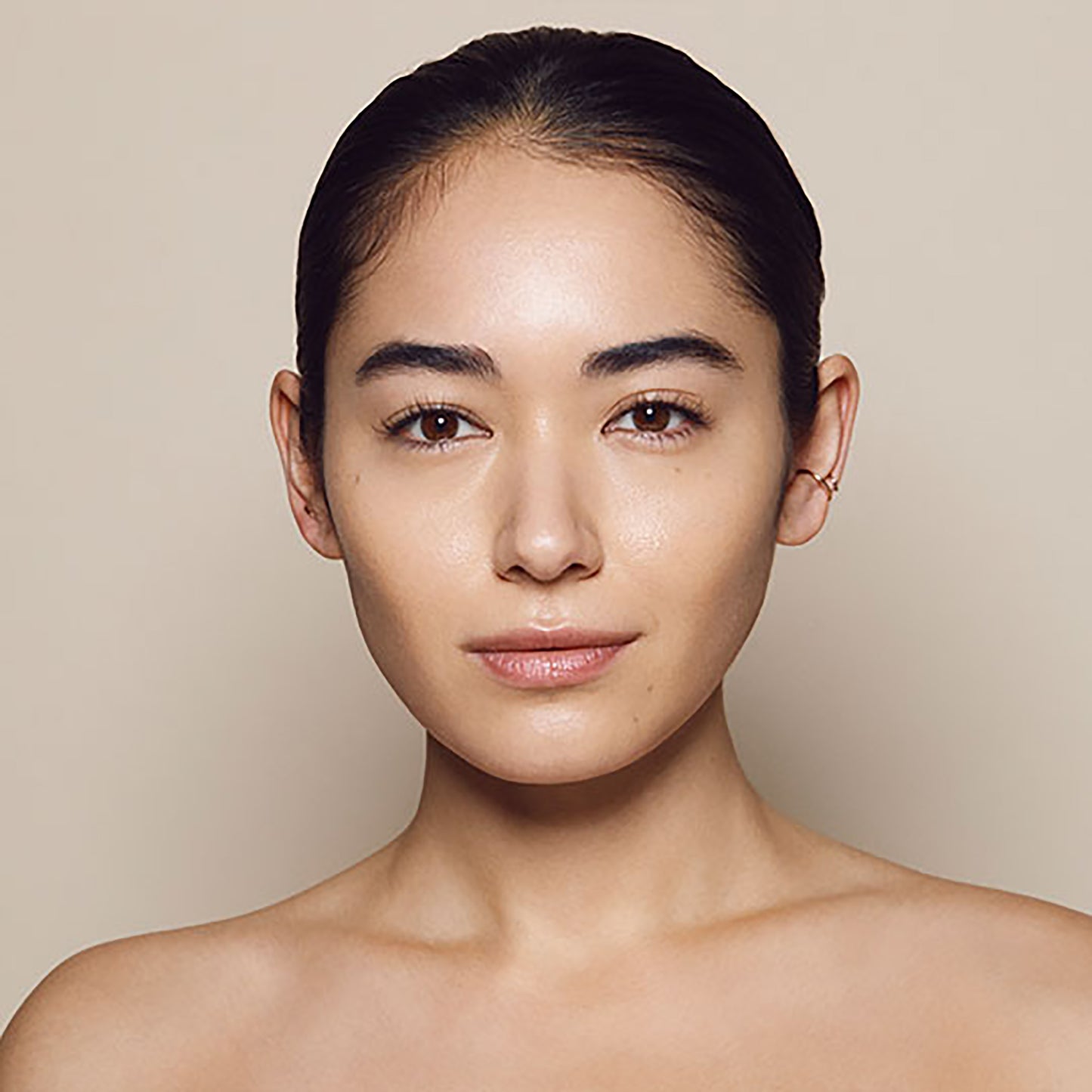 Close up of person’s face with medium, cool-toned skin