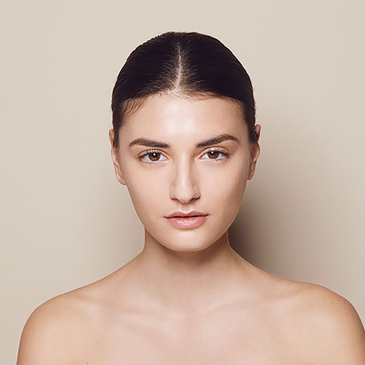 Close up of person’s face with light, cool-toned skin