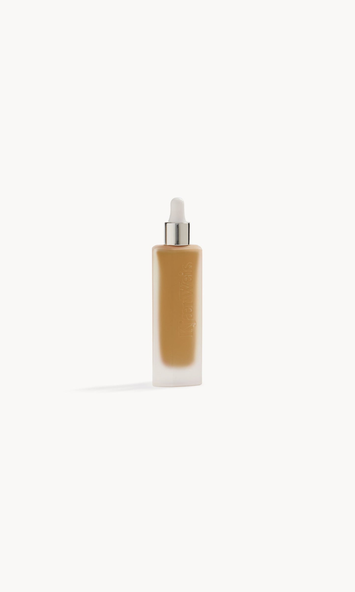 Frosted glass bottle with foundation inside and a white and silver pipette top