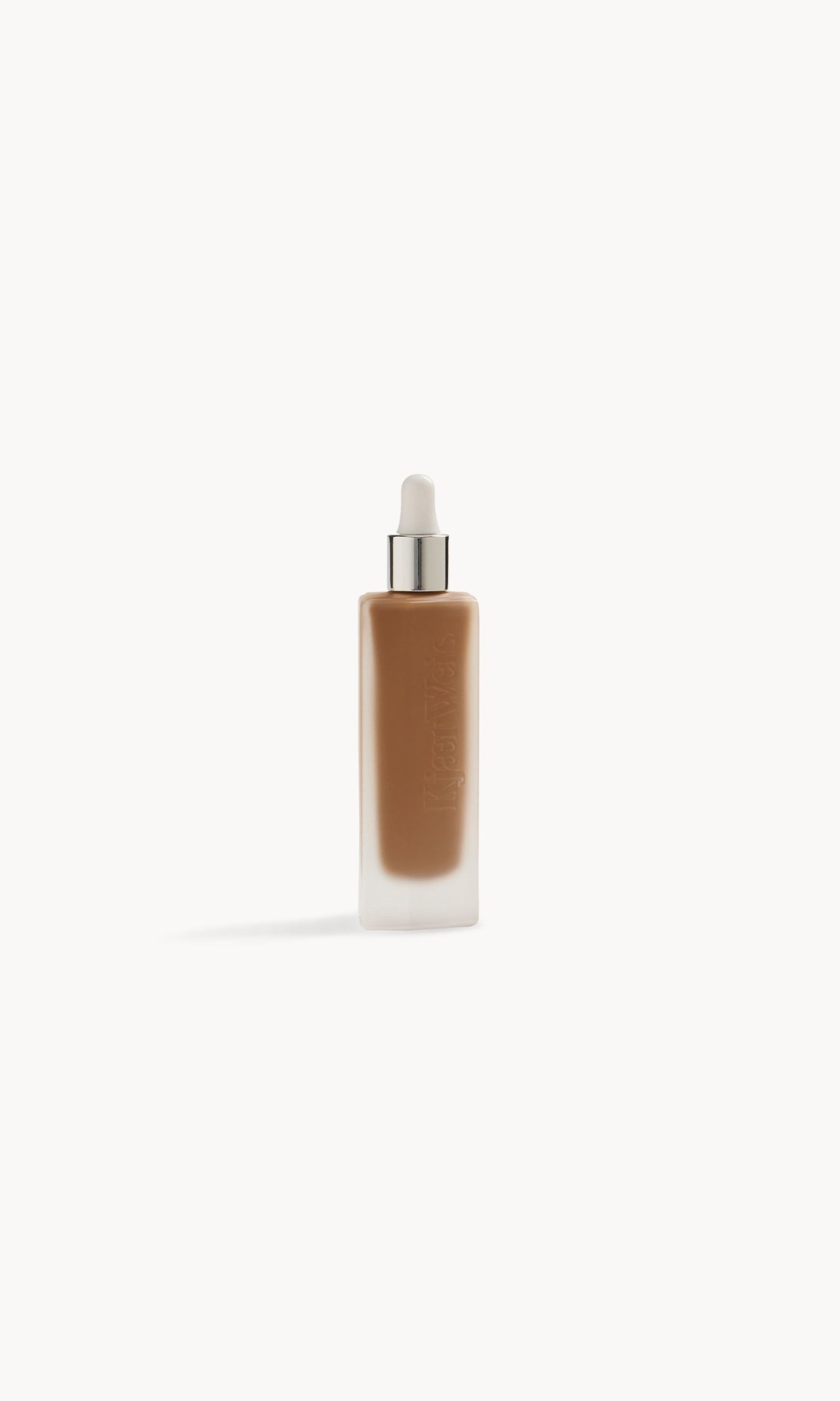 Frosted glass bottle with foundation inside and a white and silver pipette top