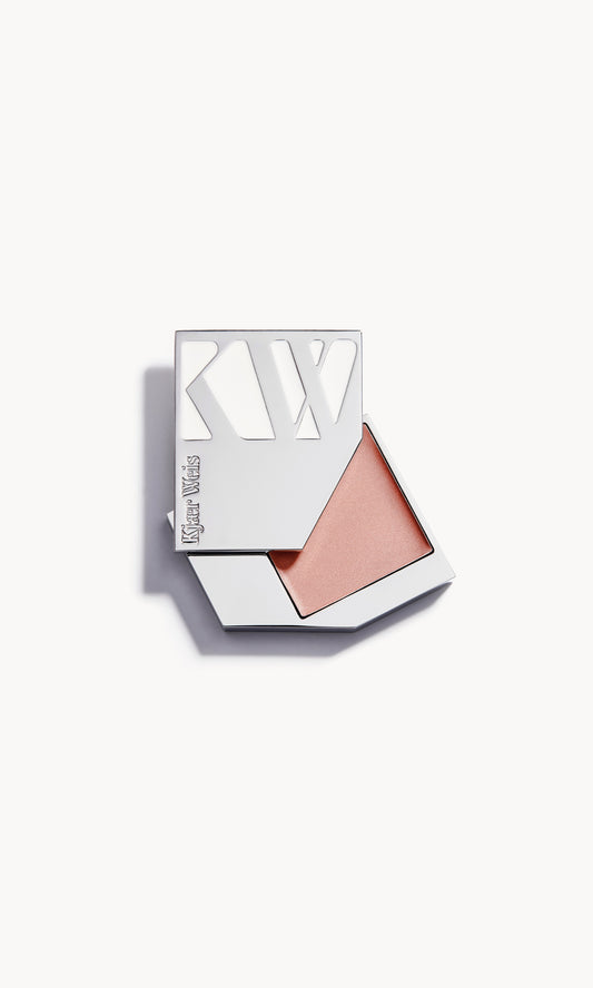 a solid silver kw palette with the lid slid open to show the cream blush