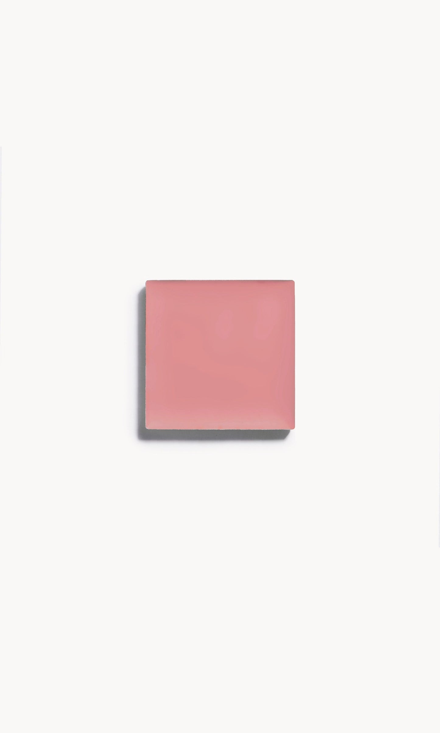 A square of taupe cream blush on a white background