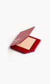 Red KW palette with lid open to show cream foundation