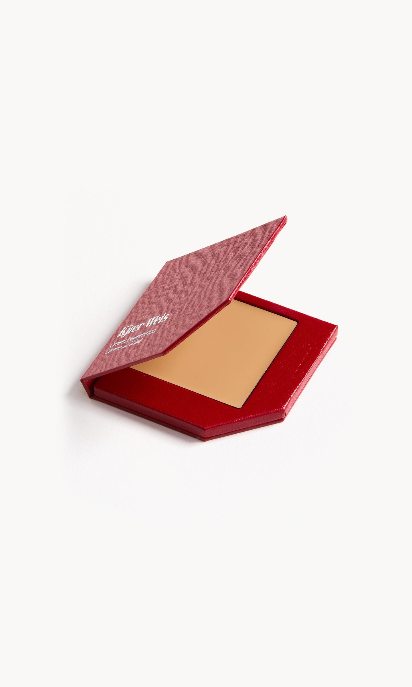 Red KW palette with lid open to show cream foundation