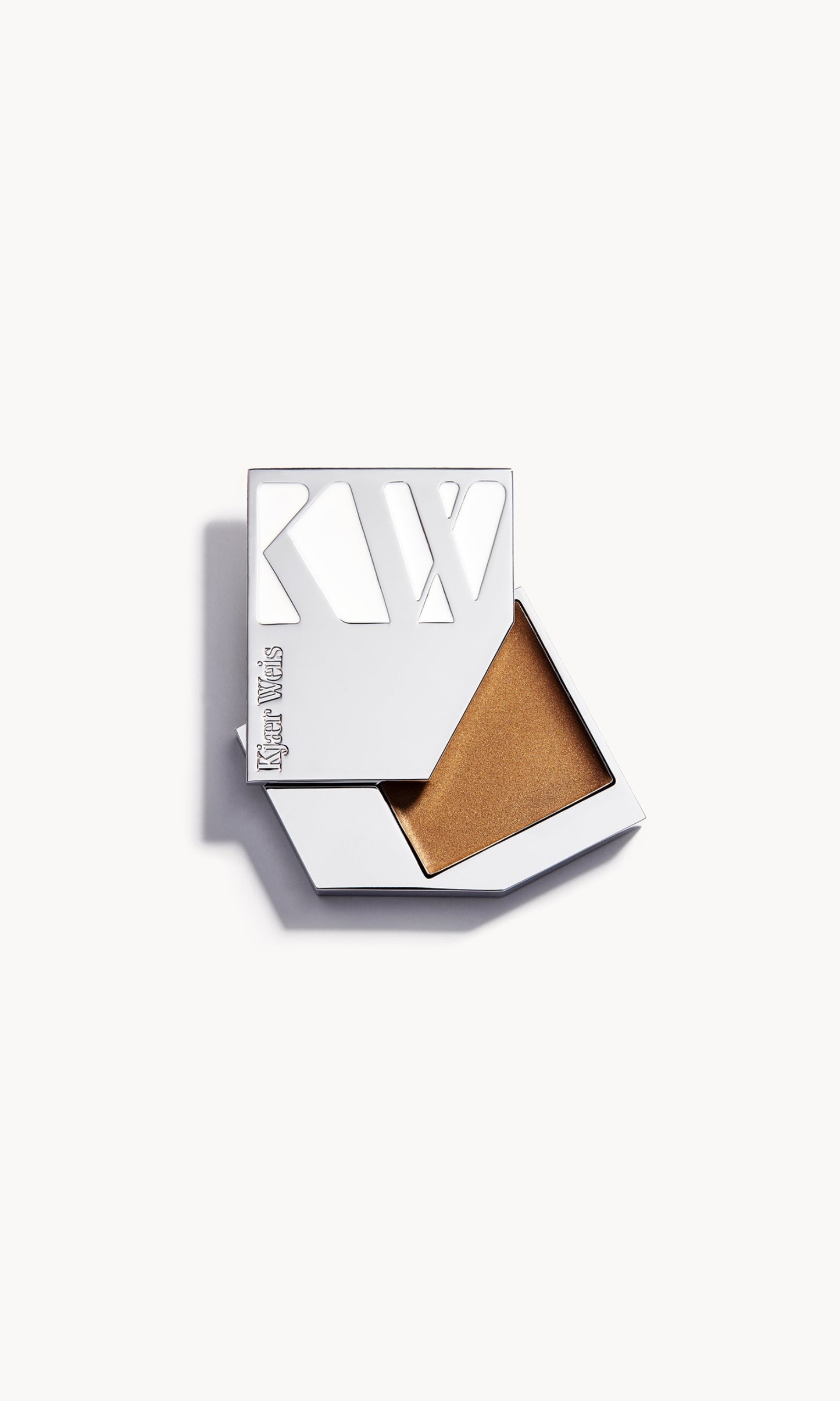 A solid metal KW palette with the lid slid open to show the cream bronzer