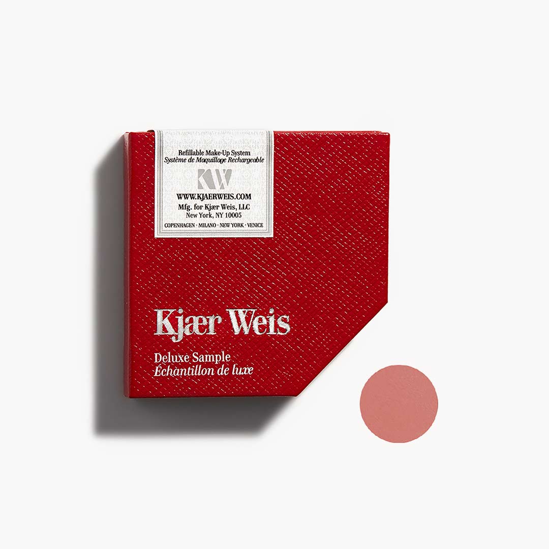 Red KW palette with a soft coral circle next to it on a white background