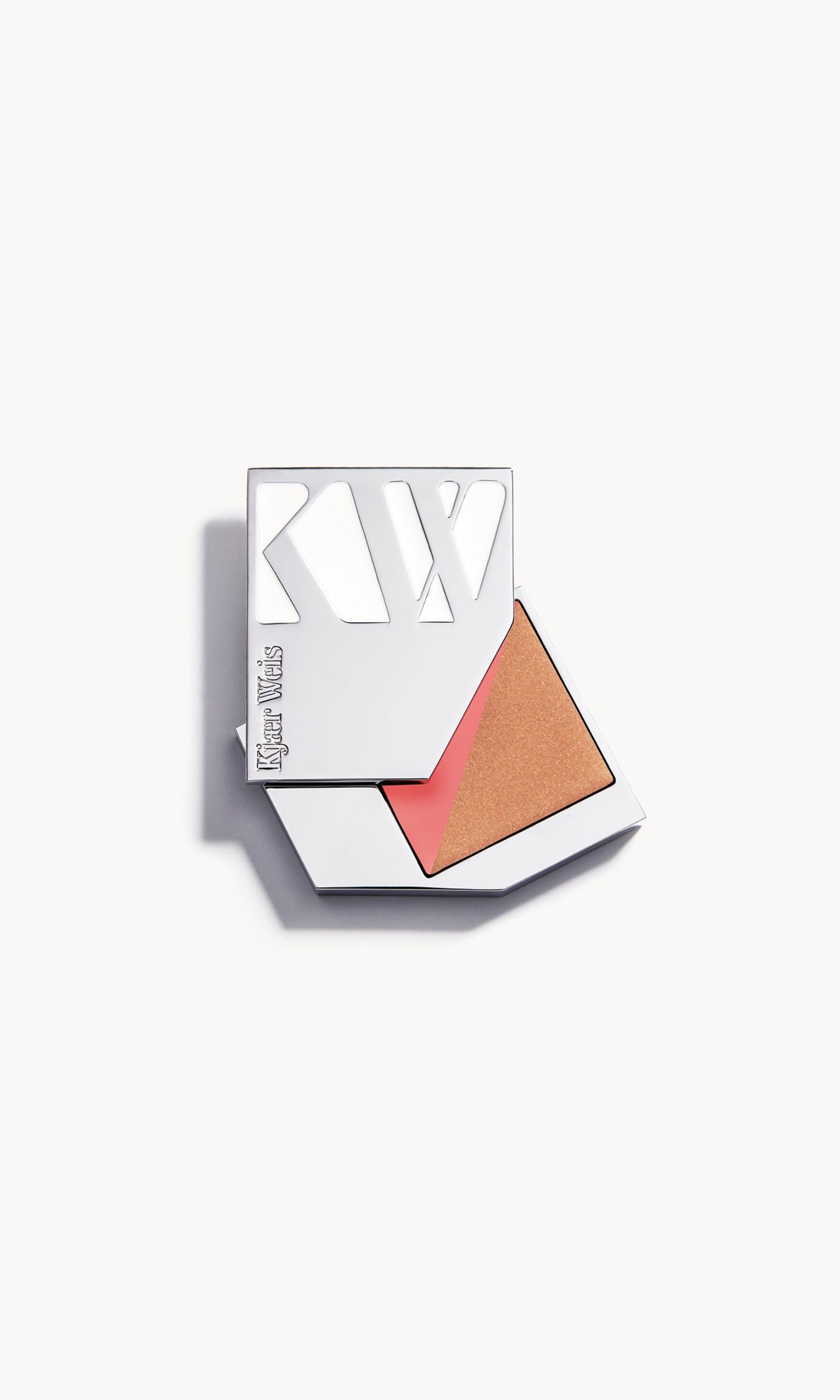 Silver metal KW palette open to show a rectangle palette split diagonally in half, with a sheer bronzer on one side and a pink cream blush on the other