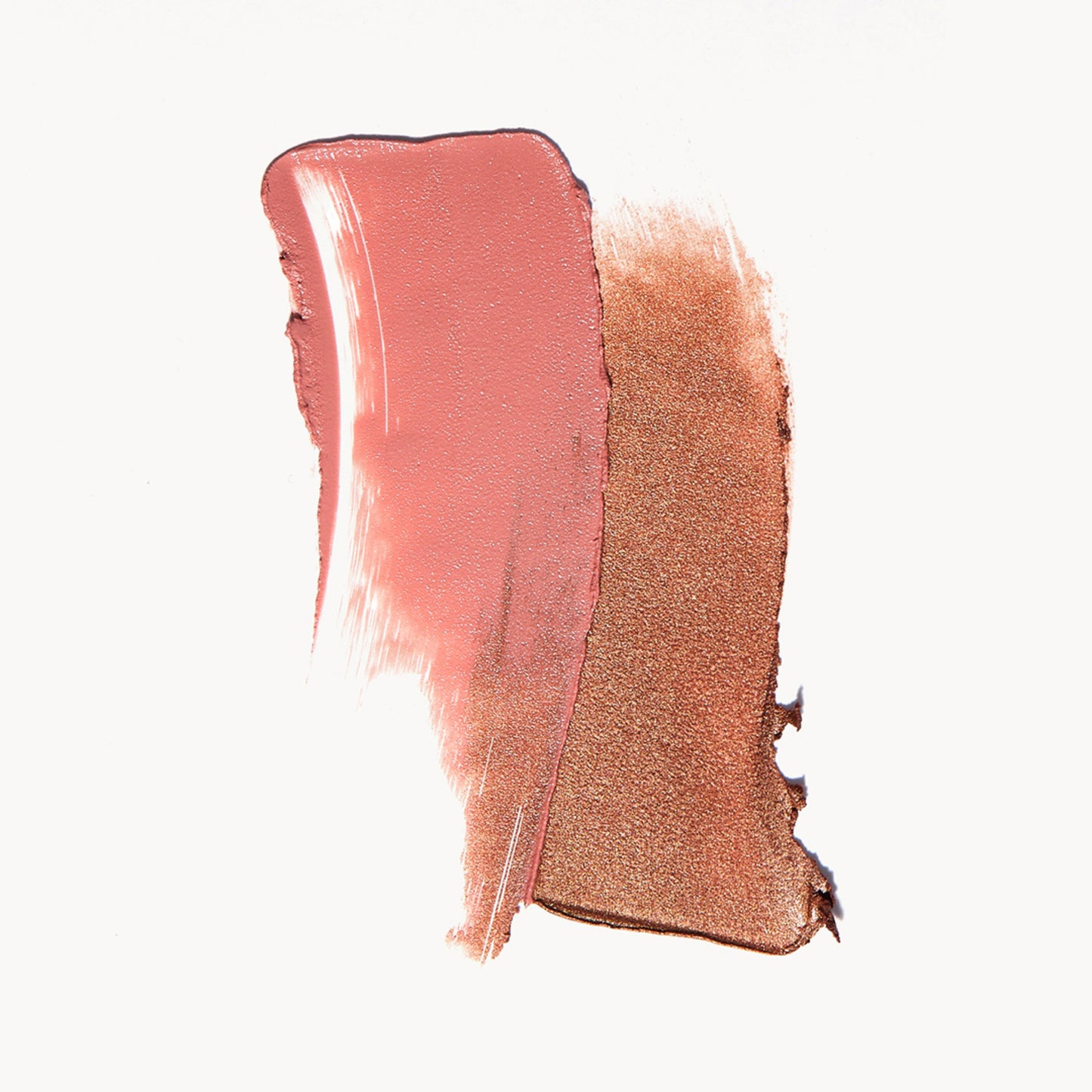 A wipe of pink cream blush and sheer cream bronzer on a white background