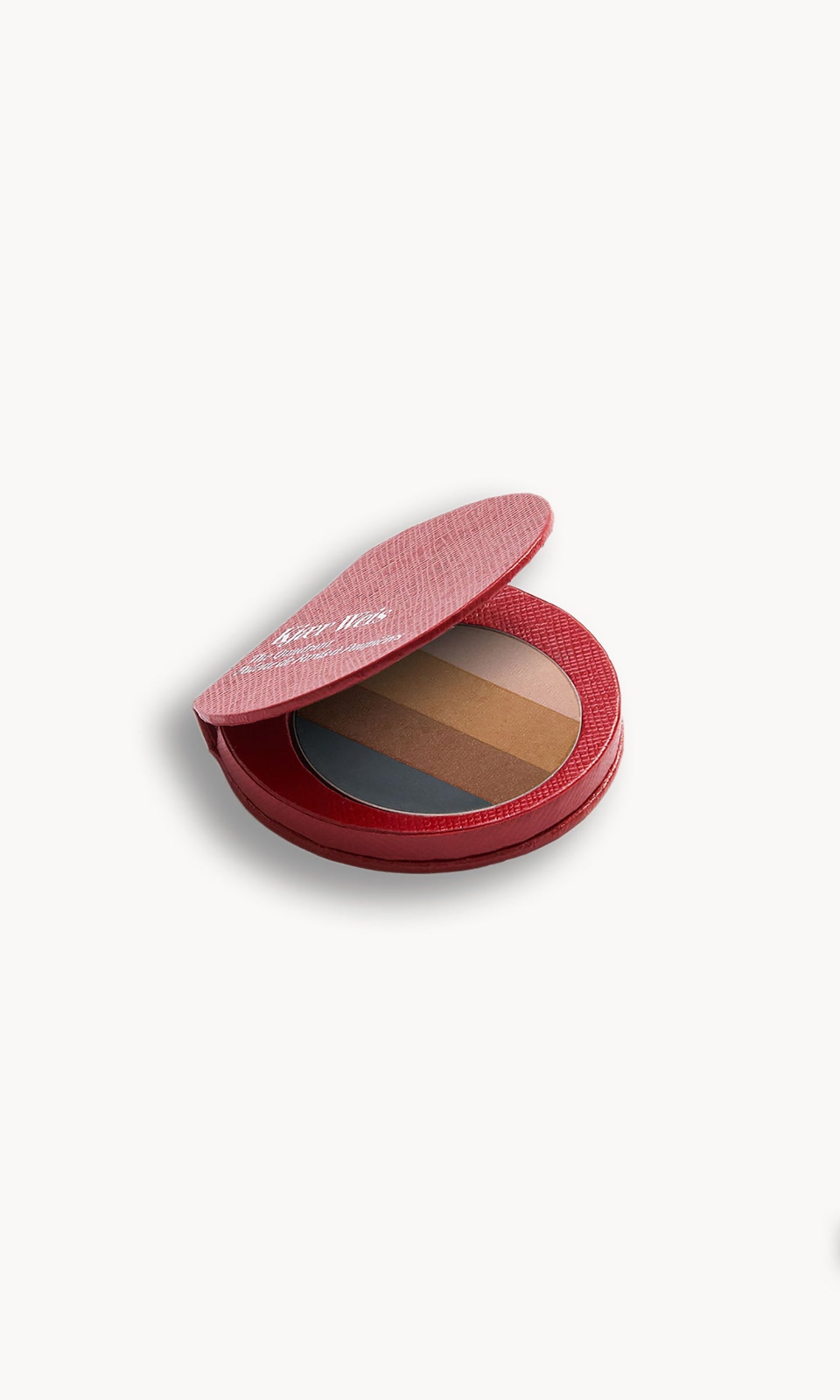 Red KW palette open to show the eye shadow quadrant inside