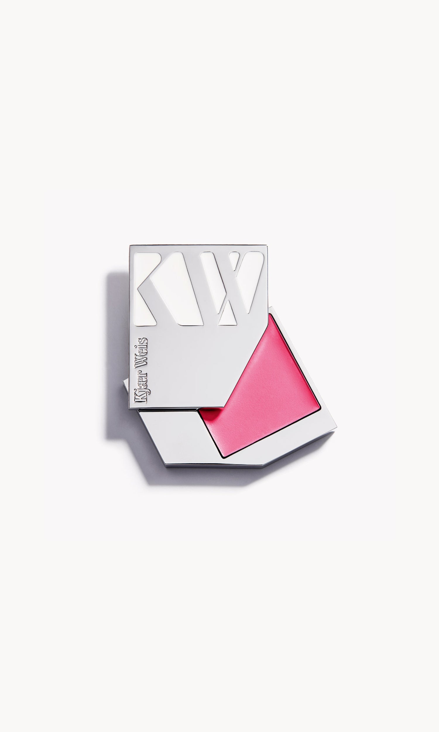 A solid silver KW palette with the lid slid open to show the cream blush