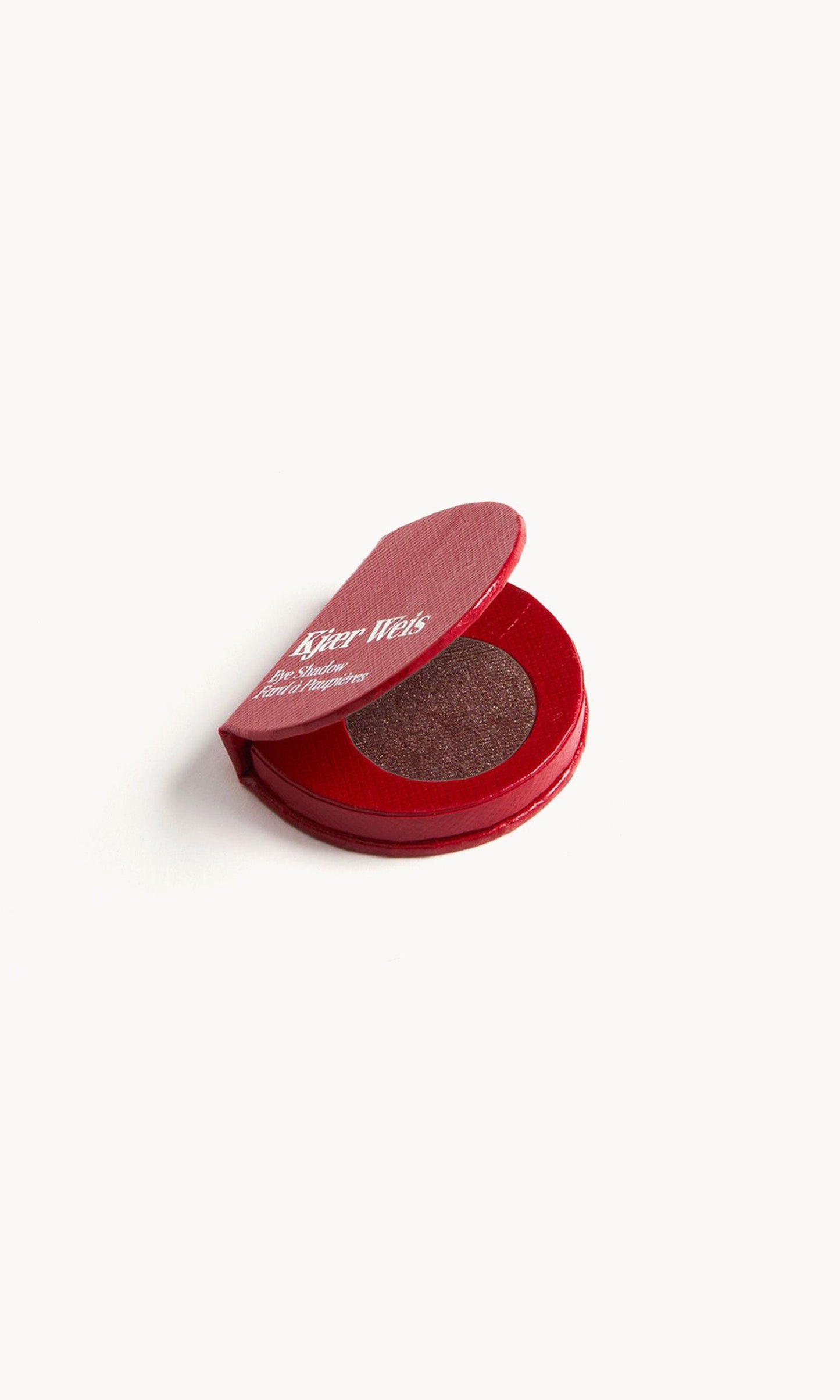 Red KW palette open to show the metallic reddish-brown copper eye shadow inside