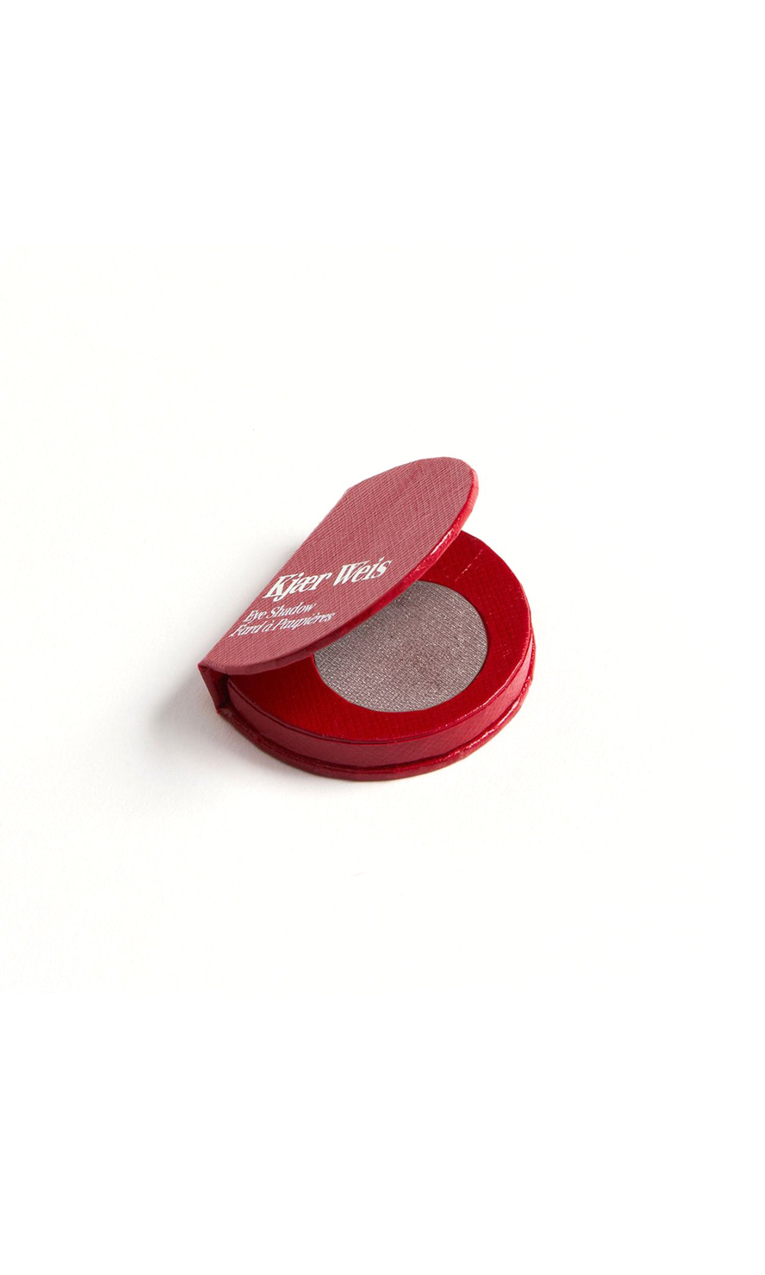 Red KW palette open to show the taupe eye shadow inside