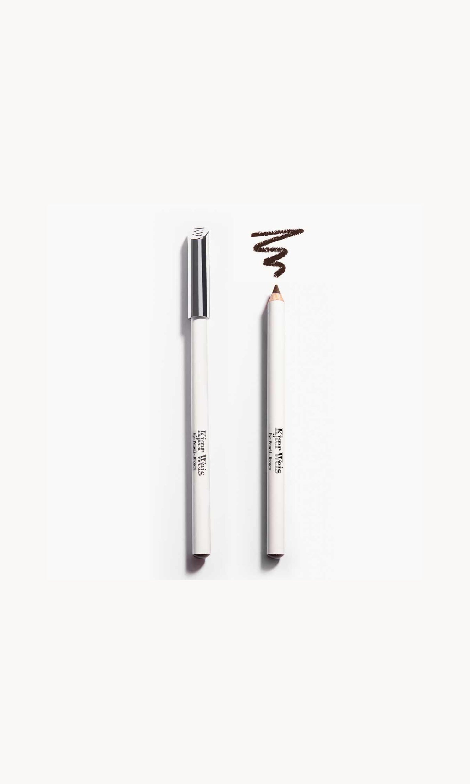 two white pencils on a white background. once pencil has a silver lid and the other shows the brown pencil with a brown line above it