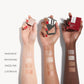 Three arms of three different skin tones all with a swatch of each cream glow shade