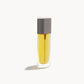 Kjaer Weis body oil in glass bottle with silver cap