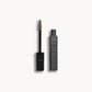 Kjaer Weis brow gel refill case next to a wand with blonde product on it