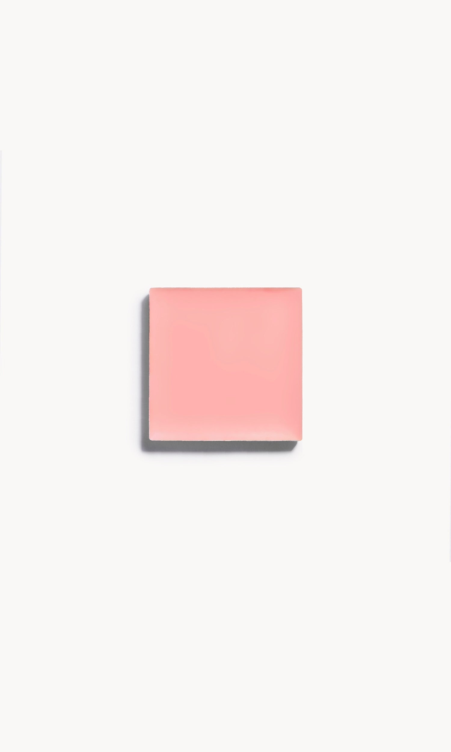 a square of nude pink cream blush on a white background
