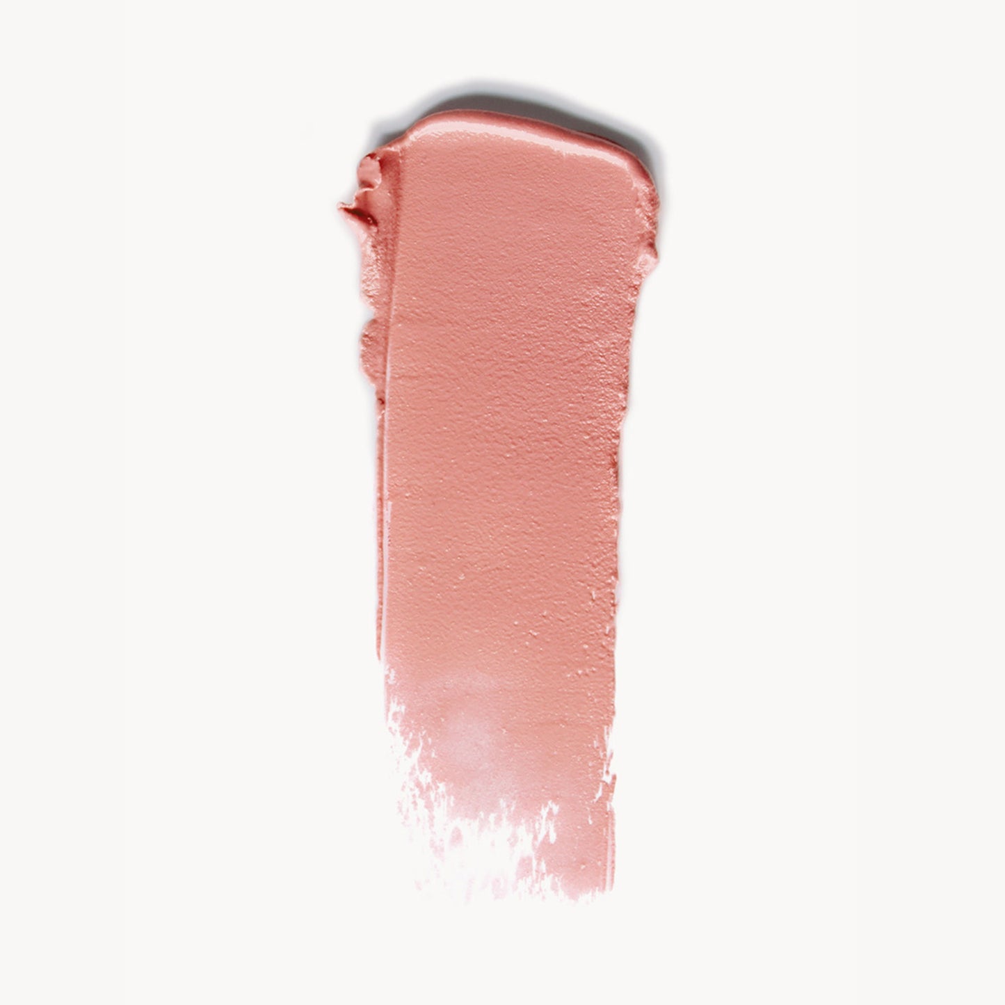 A wipe of nude pink cream blush on a white background