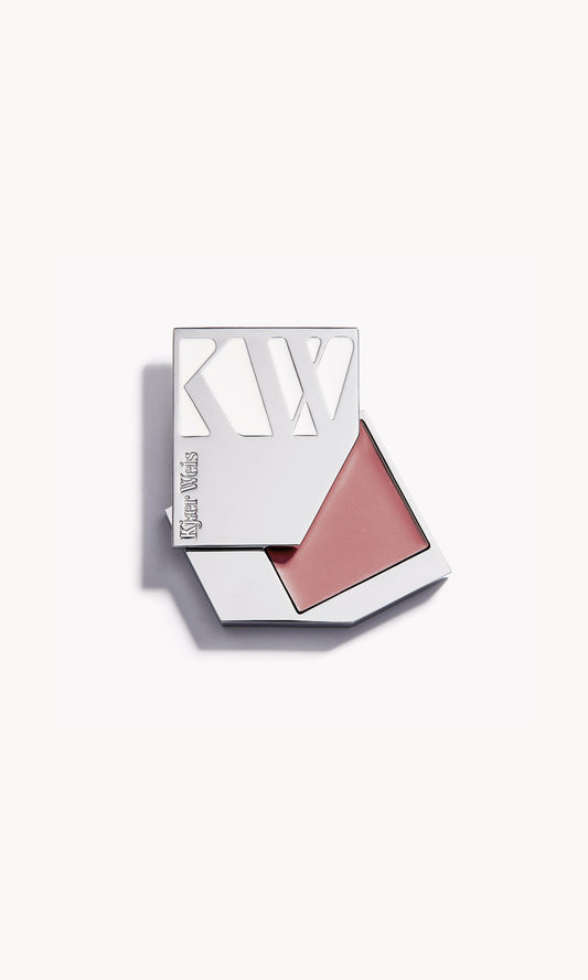 a solid silver kw palette with the lid slid open to show the cream blush