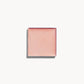 A square of light rosy taupe cream blush on a white background