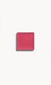 A square of deep berry cream blush on a white background