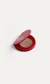 Red KW palette with lid open to show cream eye shadow