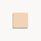 Square of fair neutral cream foundation on a white background