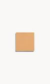 Square of medium cool-toned cream foundation on a white background