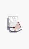 A solid metal KW palette with the lid slid open to show the cream highlighter