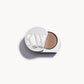 Solid metal KW palette with lid open to show light mocha eye shadow inside