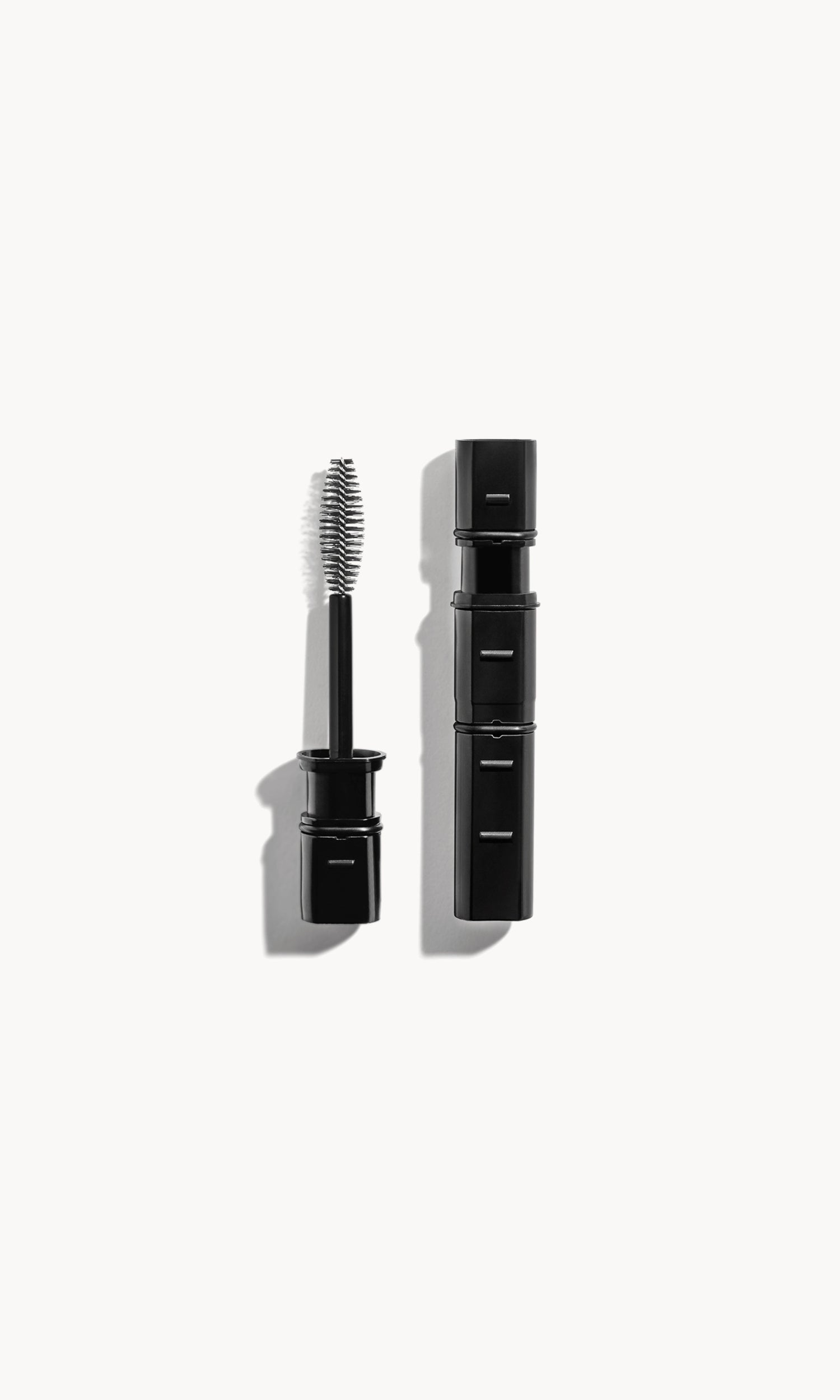 black-packaged im-possible mascara refill on a white background