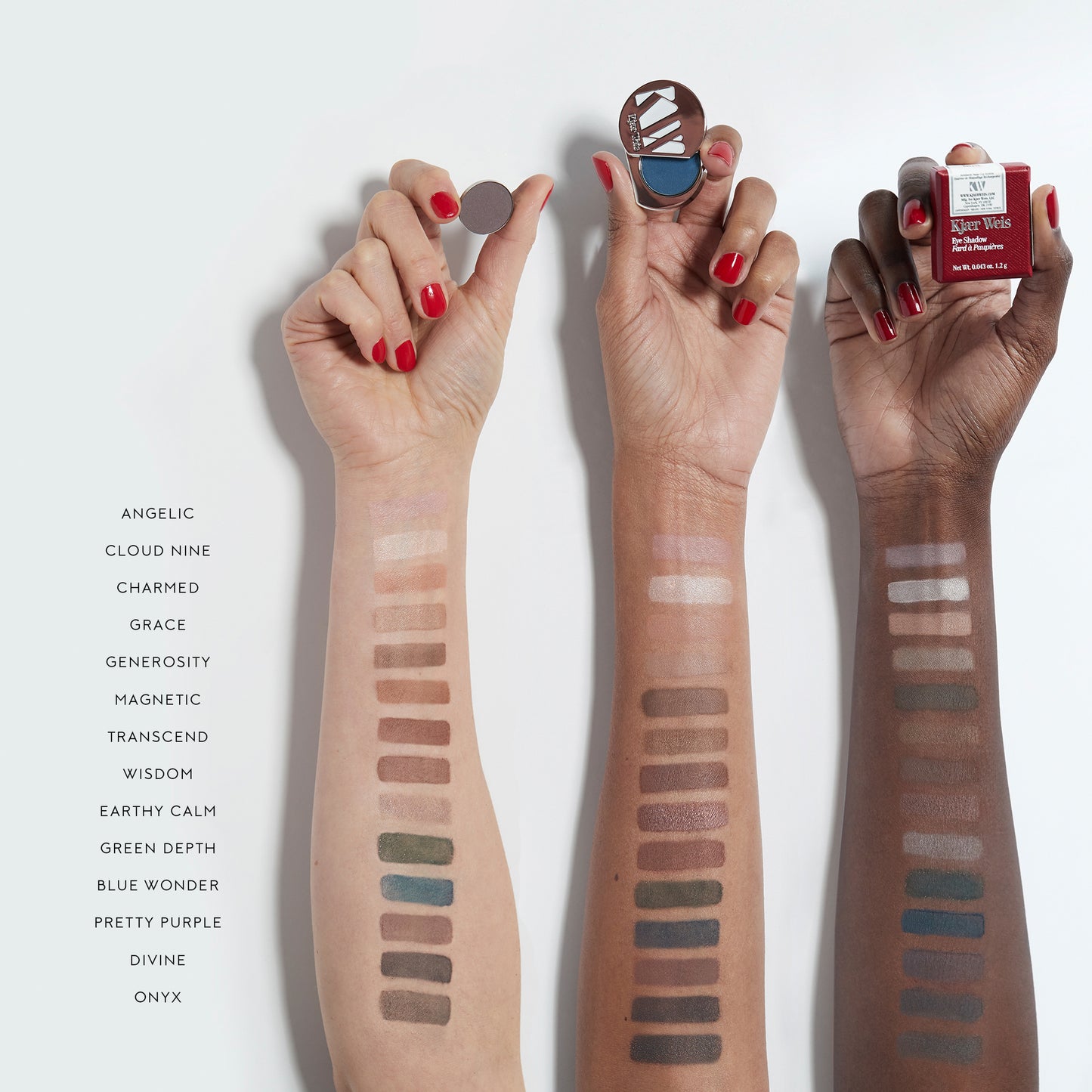 Three arms of different skin tones with swatches of eye shadow in 14 different shades