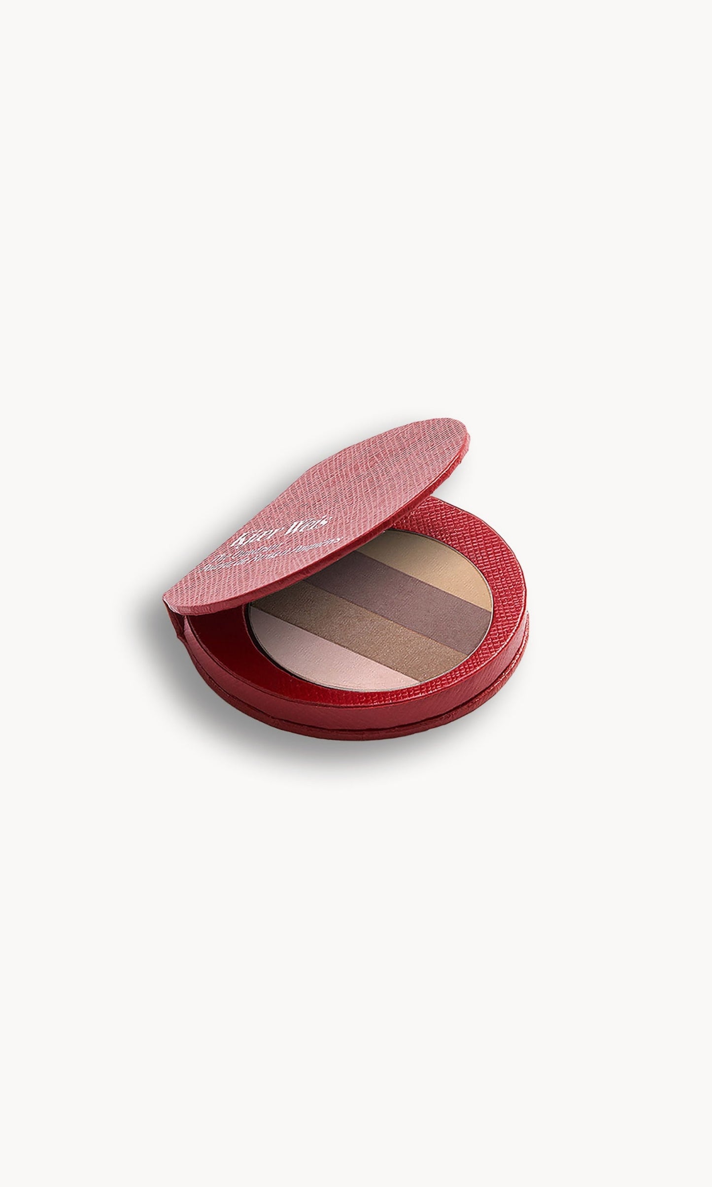 Red KW palette open to show the eye shadow quadrant inside