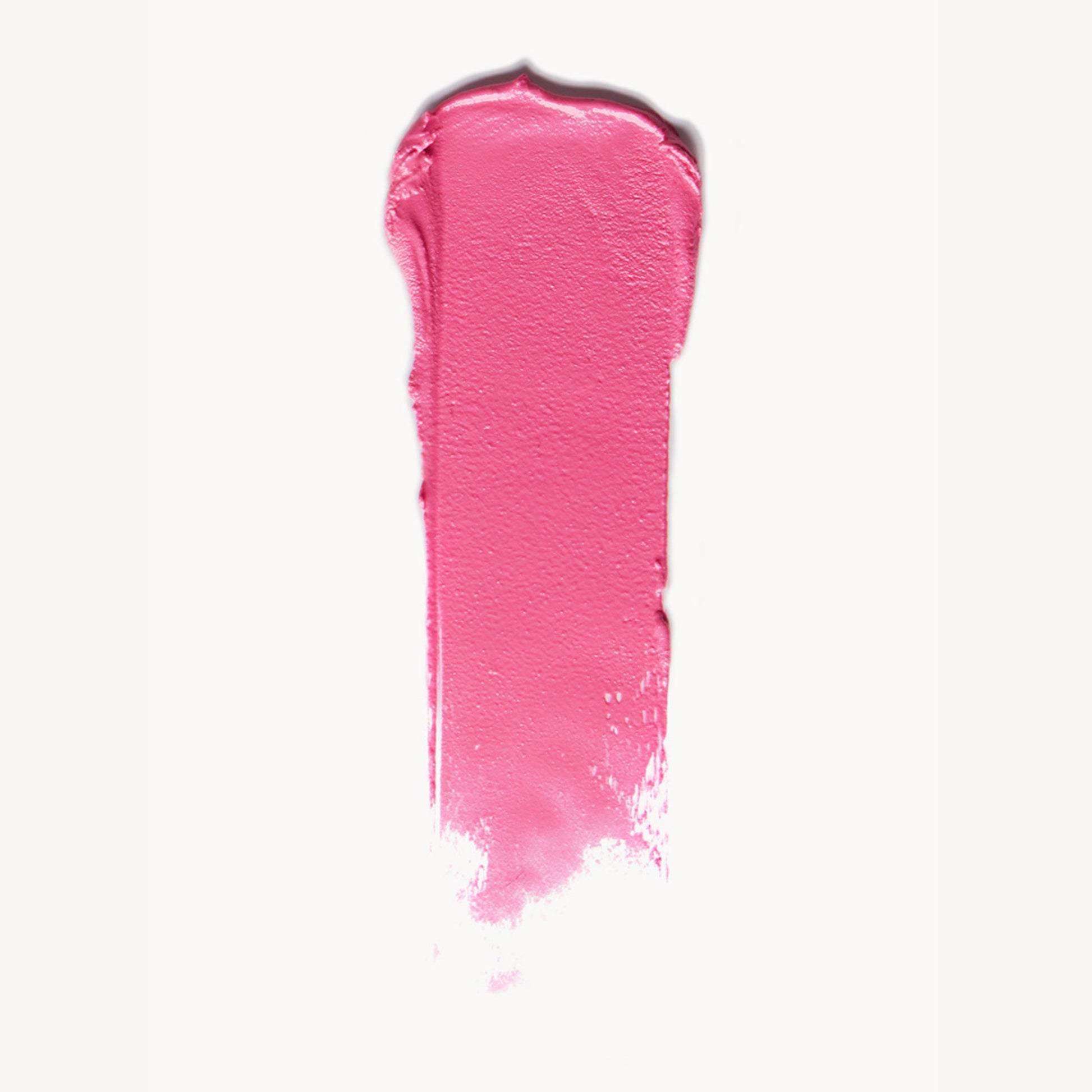 A wipe of vibrant pink cream blush on a white background