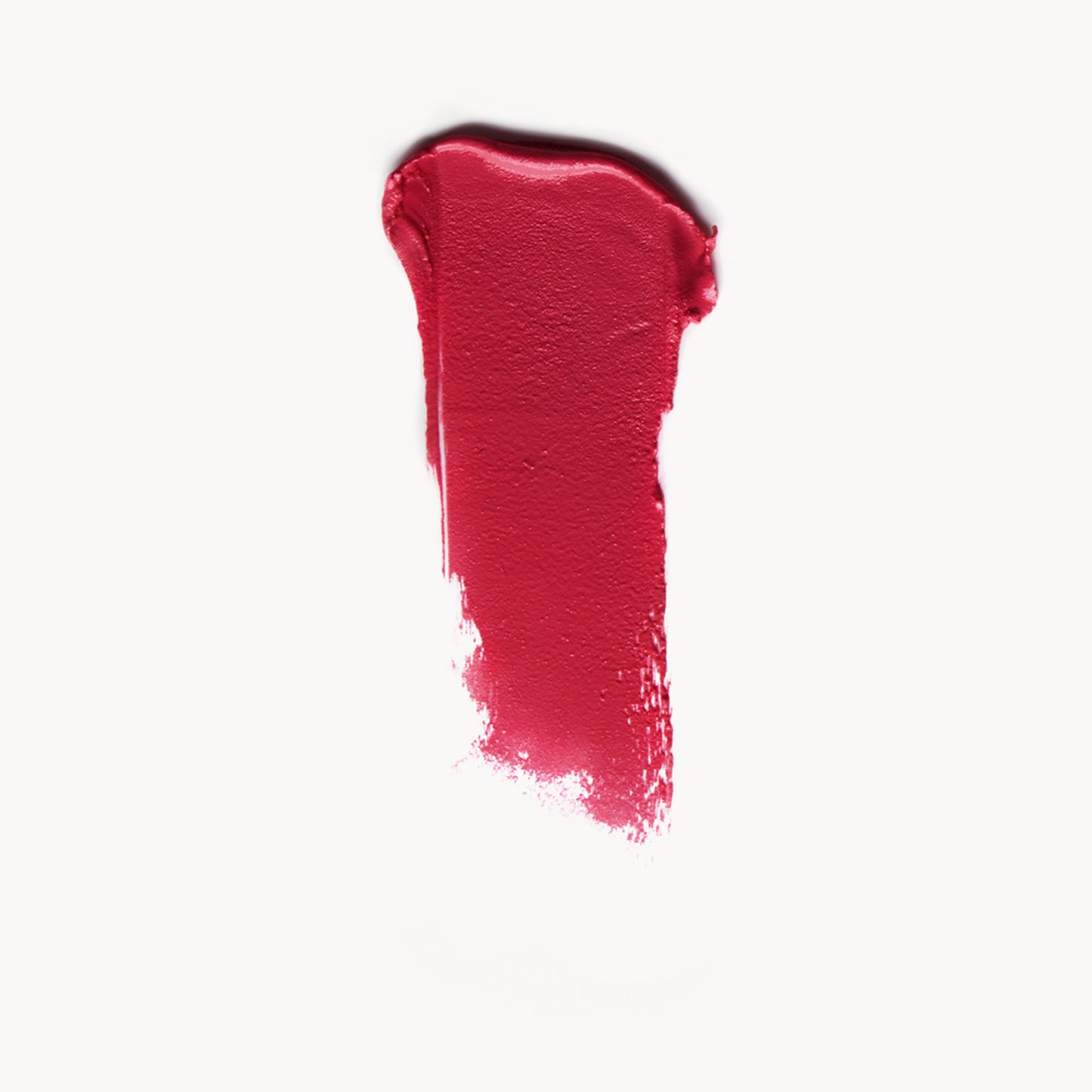 A wipe of deep berry cream blush on a white background